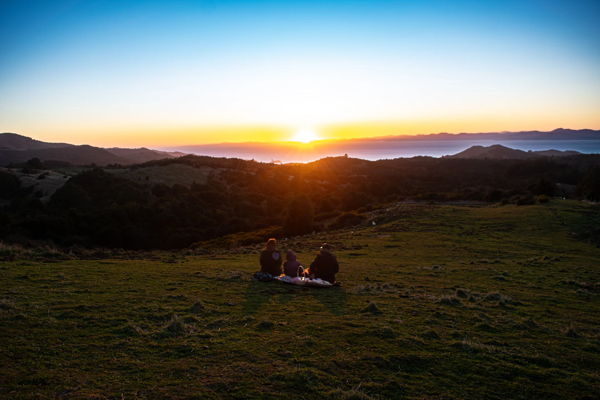 Sunset over the sea from the hill